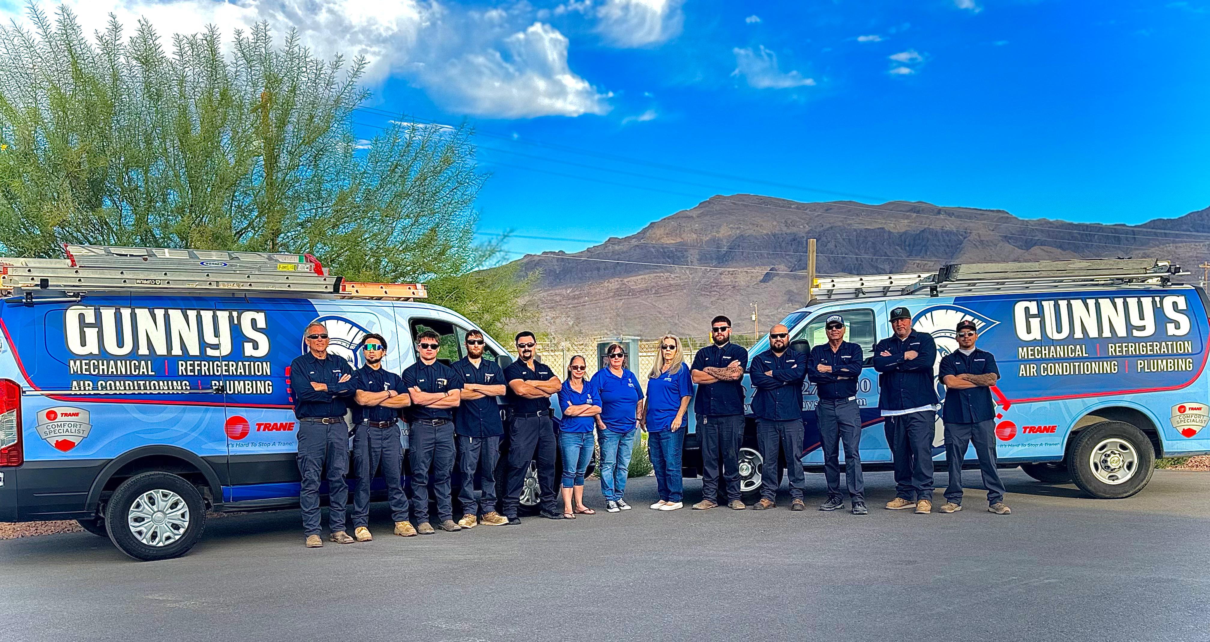 Gunny's Air Conditioning & Plumbing team with service vans in Las Vegas